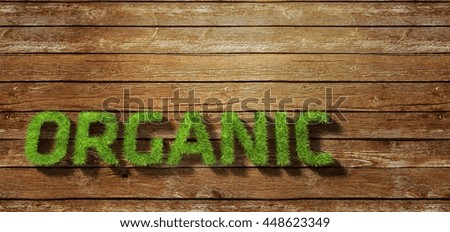 Organic made of grass on wood background