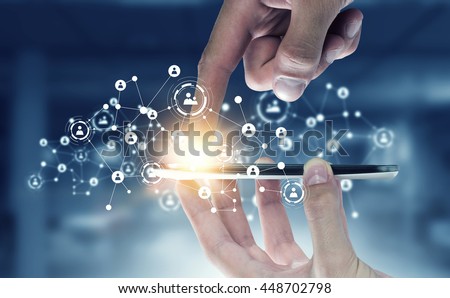 Devices connecting people . Mixed media Royalty-Free Stock Photo #448702798