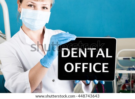 technology, internet and networking in medicine concept - femail dentist holding a tablet pc with dental office sign. at the dental equipment background