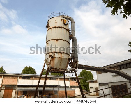 Photo Picture of Grungy weathered steel industrial silo 