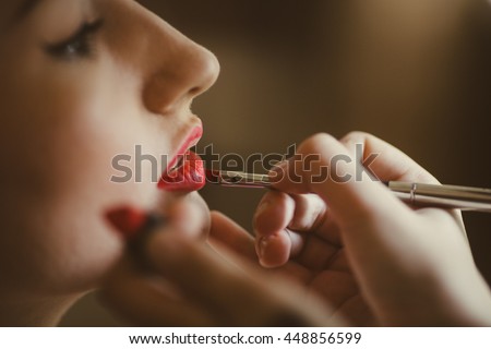 Make-up artist doing makeup Royalty-Free Stock Photo #448856599