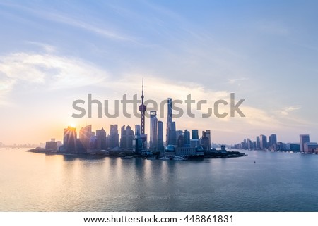 shanghai skyline and huangpu river in sunup , charming metropolitan background