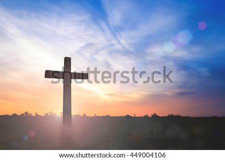 Funeral concept: Silhouette the cross on sunset background