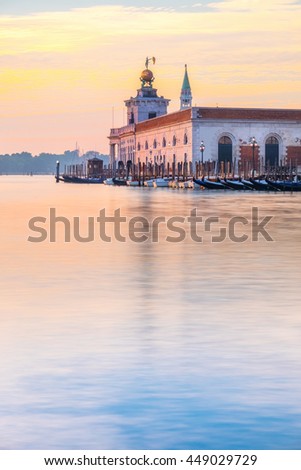 Punta della Dogane of Dogana da Mar, former Customs House in Venice, Italy on a glorious sunrise. This picture is toned.
