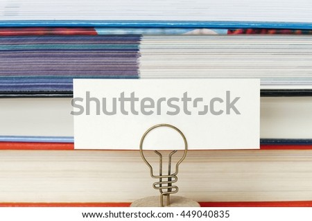 blank message card for free text in the photo holder with the textbook background