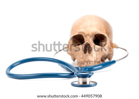 skull and stethoscope on white background