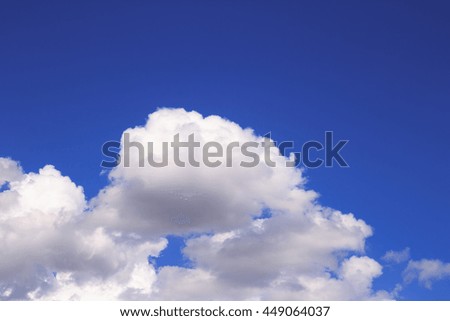 Blue sky And fluffy white clouds In the rainy season in Thailand