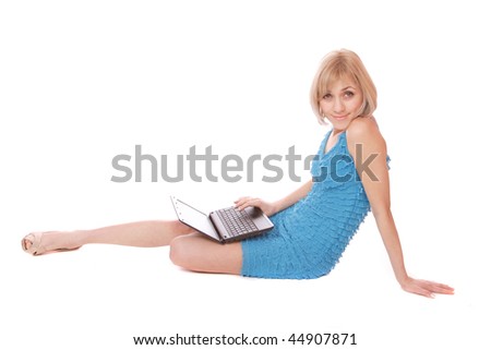 Beautiful excited young woman with a laptop on white