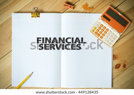 FINANCIAL SERVICE text on paper in the office , business concept