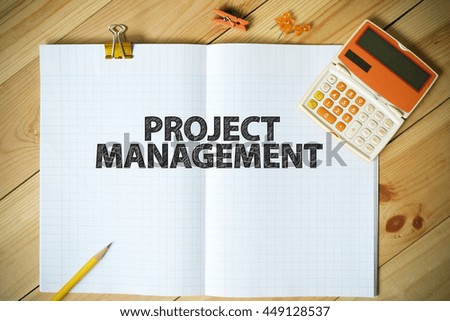 PROJECT MANAGEMENT  text on paper in the office , business concept