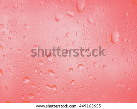 clean rain drop on car, rain water, orange background