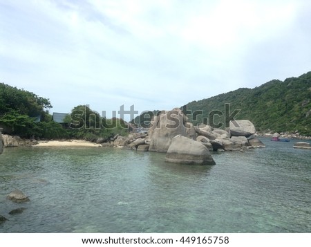 Big rocks, transparent sea and blue sky at Tao island (Koh Tao) in Thailand