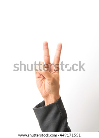 Businessman and gesture topic: a man in a black suit and white shirt showing hand gesture on an isolated white background
