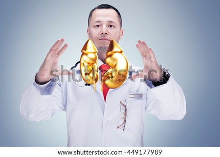 Doctor with stethoscope and golden kidneys on the hands in a hospital. High resolution.