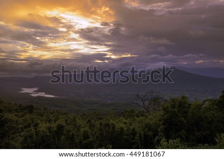 Mountain sunset purple sky blue.