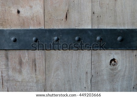 Wood wall background with metal border