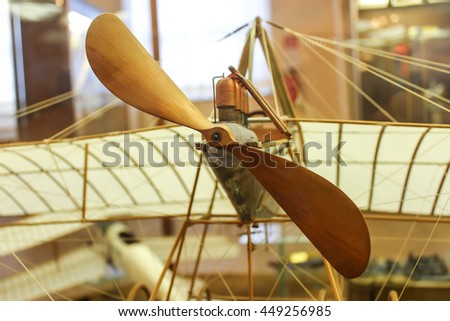 Vintage wooden airplane model by daVinci's sketches  Royalty-Free Stock Photo #449256985