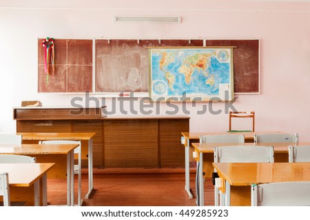 Room for teaching geography at school with a map on the wall. Royalty-Free Stock Photo #449285923