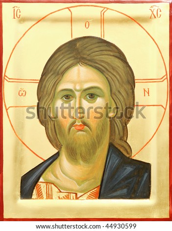 Representation of Jesus Christ face on wooden icon with gilding