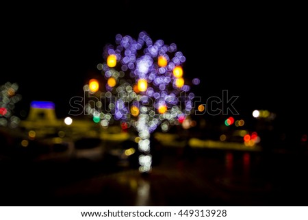 Defocused christmas tree with colorful lights