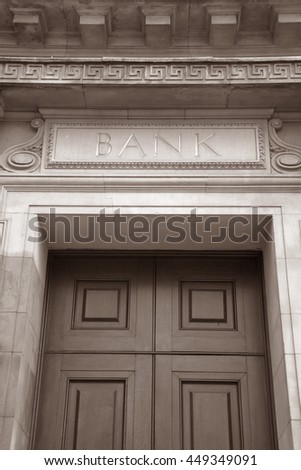 Bank Sign on Stone Facade in Black and White Sepia Tone
