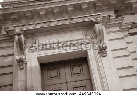 Bank Sign on Stone Facade in Black and White Sepia Tone