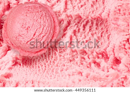 strawberry ice cream scoop from top or from above on textured ice cream background