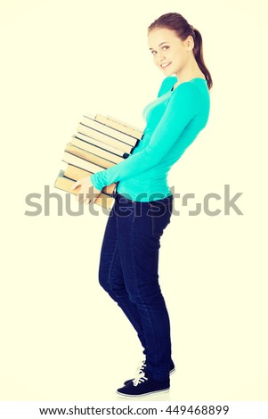 Young caucasian student with books