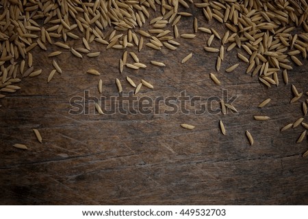 paddy seed with old wood table