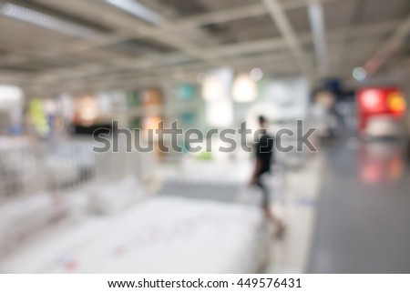 Blur picture : people are walking in exhibition