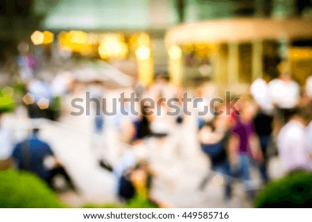 Abstract bokeh background of business people meet at bar on happy hour
