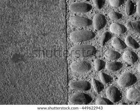 Close-up of two different street pavement. Monochrome background, colorless.