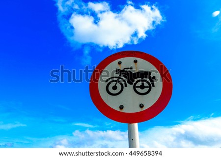 Road sign of parking motorcycle on the sky background