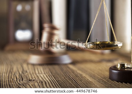 Mallet, legal code and statue of justice. Law concept, studio shots