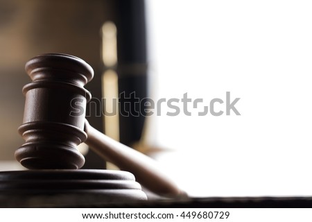law theme, mallet of the judge, justice scale, hourglass, books, wooden desk Royalty-Free Stock Photo #449680729