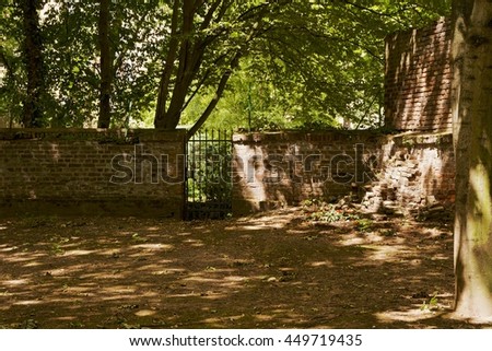 cemetery wall with gate