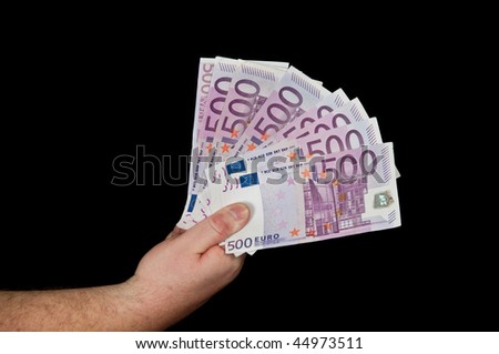 photo of a male person with 500 euro in cash on black