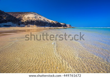 Sotavento sandy beach with vulcanic mountains in the background, Jandia, Fuerteventura, Canary Islands, Spain.