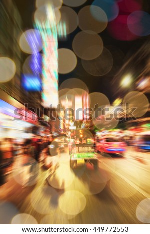 Abstract image of motion blurred traffic and night lights with bokeh in Bangkok.