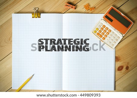 STRATEGIC PLANNING text on paper in the office , business concept