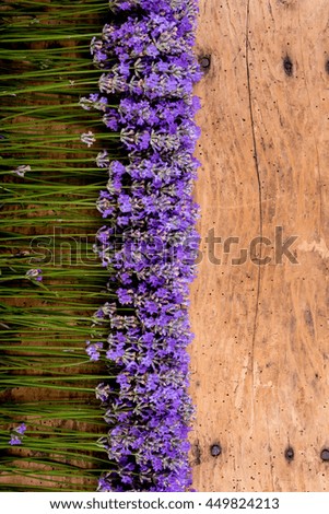 frame of lavender on a rustic wooden background - selective focus, copy space