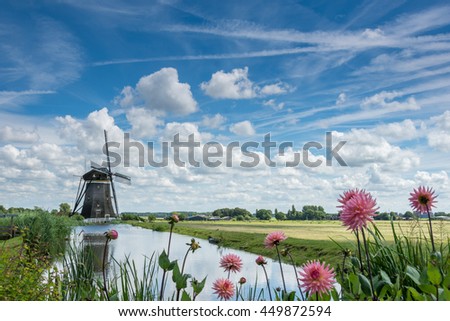 Typical Dutch landscape . Taken in Leidschendam with coastal clouds