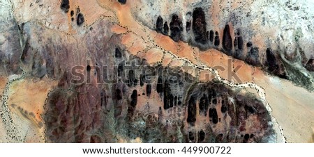 brigands houses, abstract photography of the deserts of Africa from the air. aerial view of desert landscapes, Genre: Abstract Naturalism, from the abstract to the figurative, contemporary photo art