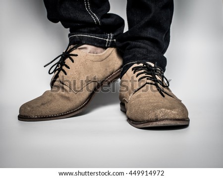 shoes man vintaeg and blue jeans