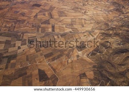 Wind-turbines in a fields of Spain. Picture made form hot air balloon.