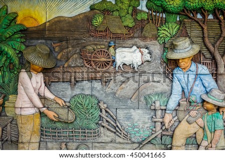 Picture of farmer craft on the stone at the public temple wall