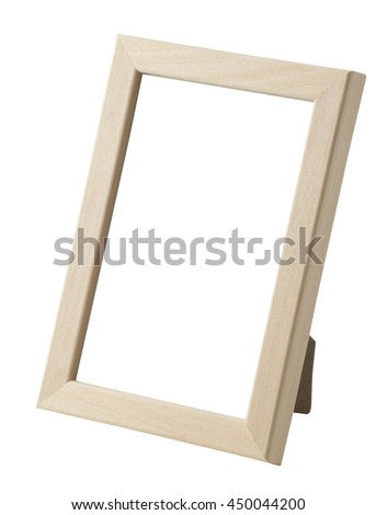 Blank photo frame at the desk isolated on white background. Include clipping path.