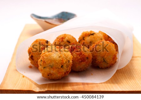 Fried rice balls with green onion, bacon and Italian cheese Mozzarella Royalty-Free Stock Photo #450084139