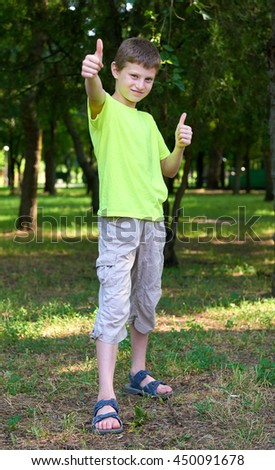 teenage boy portrait show best gesture on outdoor, summer season