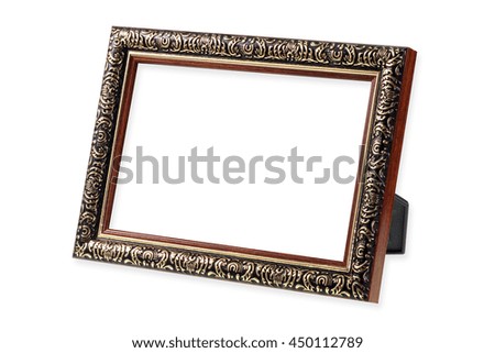 The antique wooden and gold frame on the white background